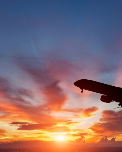 airplane-flying-in-sunset airplane-flying-in-sunset